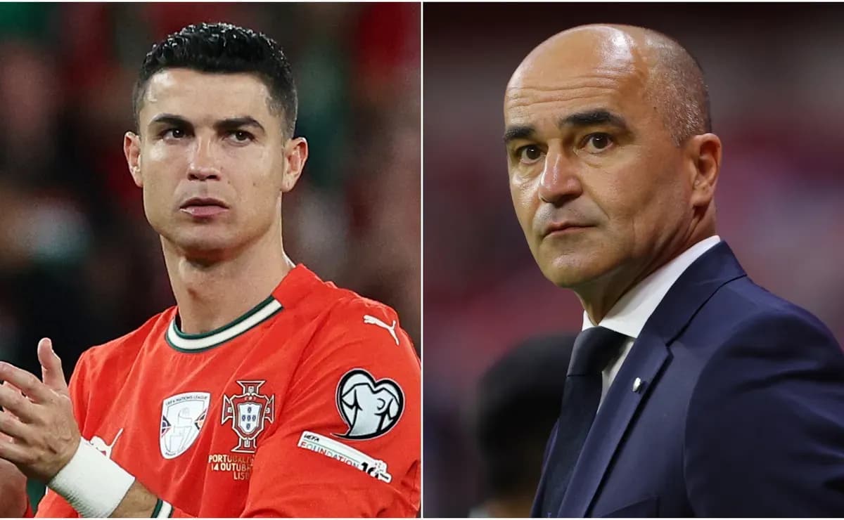 Cristiano Ronaldo listens intently as Portugal manager Roberto Martinez explains a tactics board during a team meeting, likely detailing the fixed-base travel strategy for the 2026 World Cup.