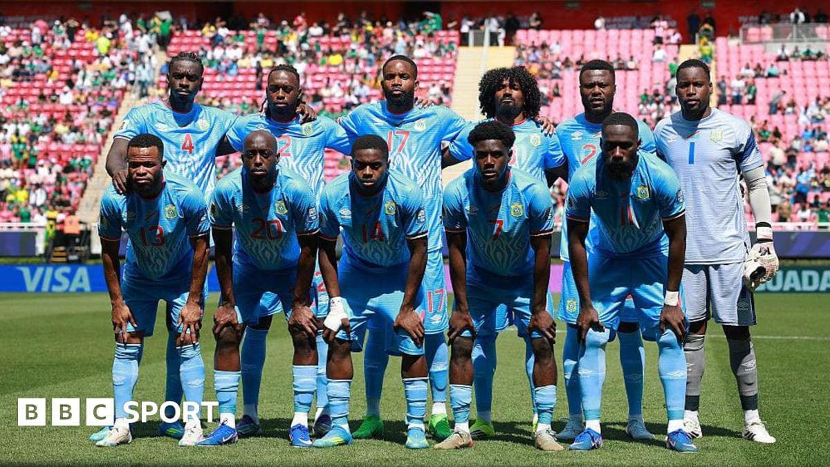 DR Congo national team players posing for a group photo before a match, with the 2026 World Cup in doubt due to Ebola isolation requirements.