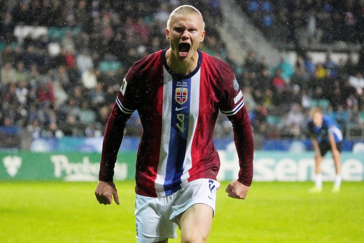 Erling Haaland and Martin Ødegaard celebrating together for Norway during a World Cup qualifier, with Kylian Mbappé training in the background representing the France vs Norway Group I clash.