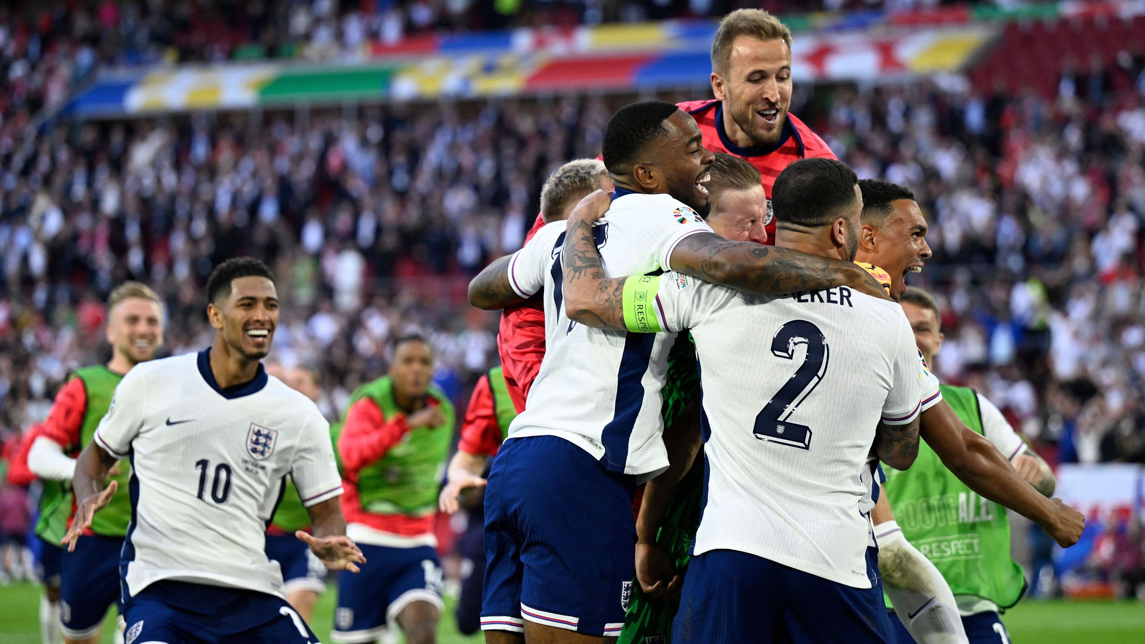 Graphic announcing England's 2026 World Cup squad featuring Jude Bellingham, Harry Kane, and John Stones.