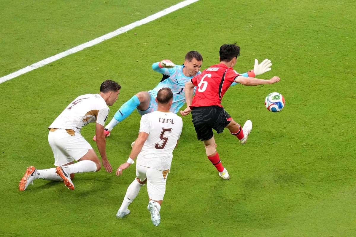 Hwang In-beom celebrates his goal for South Korea against Czech Republic goalkeeper Matej Kovar during the World Cup 2026 group stage match in Guadalajara, Mexico.