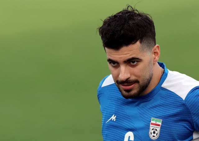 Iran's national football team training in Antalya, Turkey, ahead of the 2026 World Cup, with players focused amid US-Iran tensions.