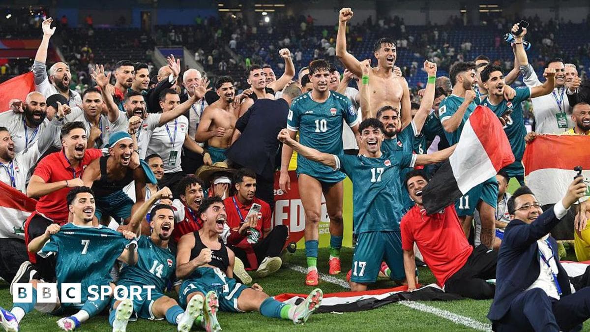 Iraq national football team players celebrating on the pitch after securing World Cup 2026 qualification in a play-off match in Mexico