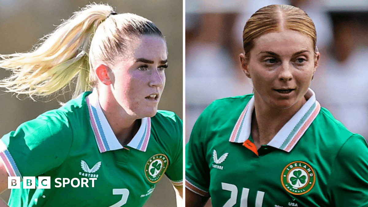 Jessie Stapleton and Hayley Nolan in Ireland training gear, Stapleton controlling a ball while Nolan looks on, both poised for action.