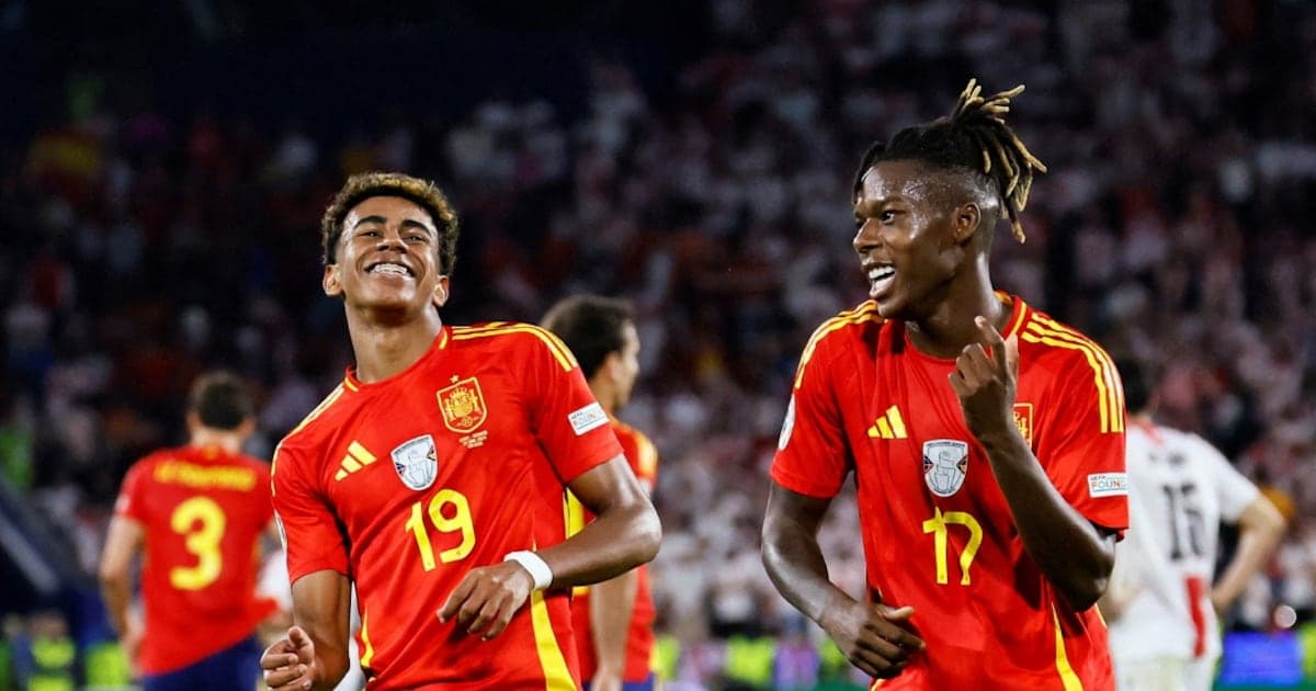 Lamine Yamal and Nico Williams celebrating a goal for Spain at Euro 2024.