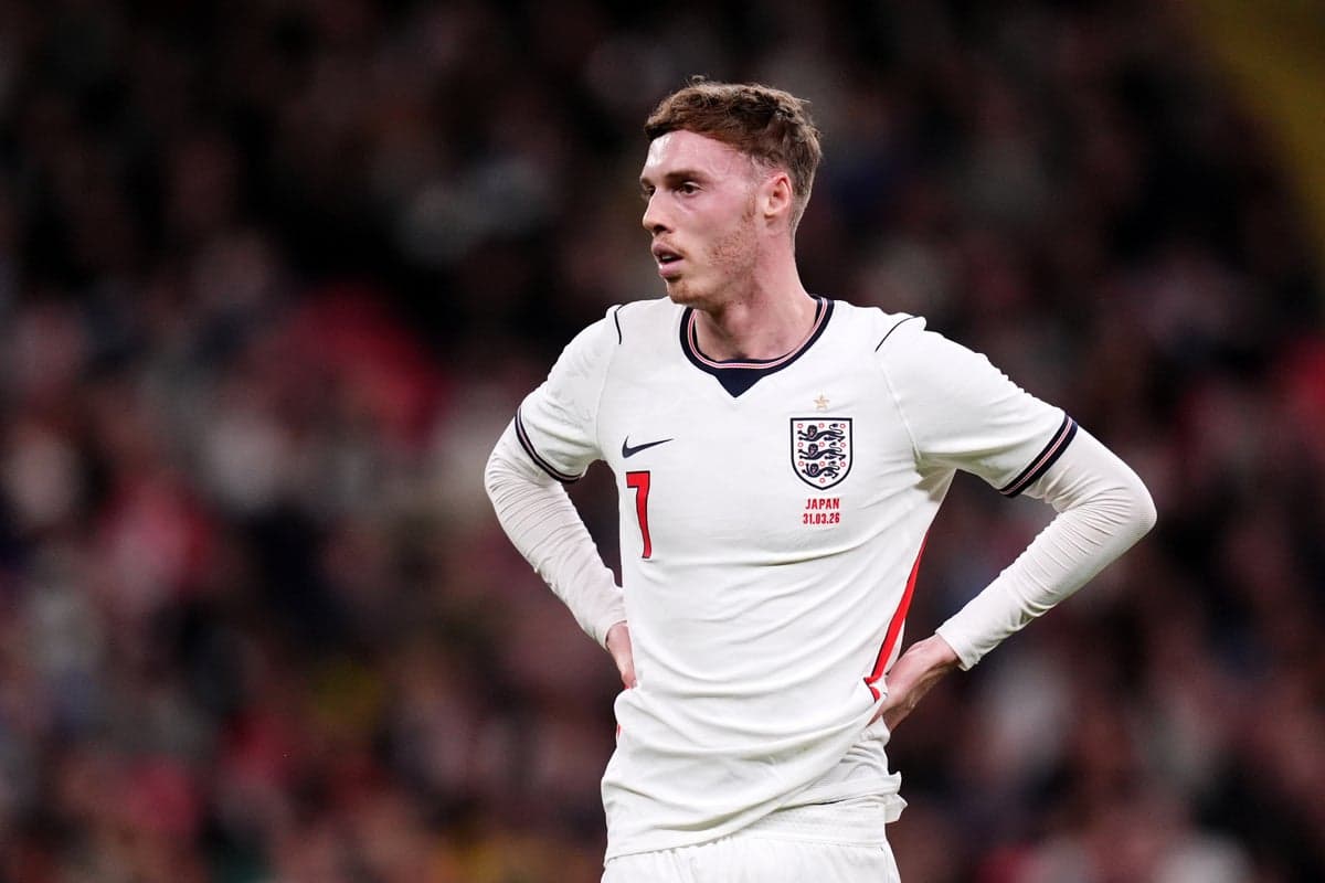 Split image showing a dejected Cole Palmer in a Chelsea shirt and a stern-faced Thomas Tuchel pointing from the touchline.